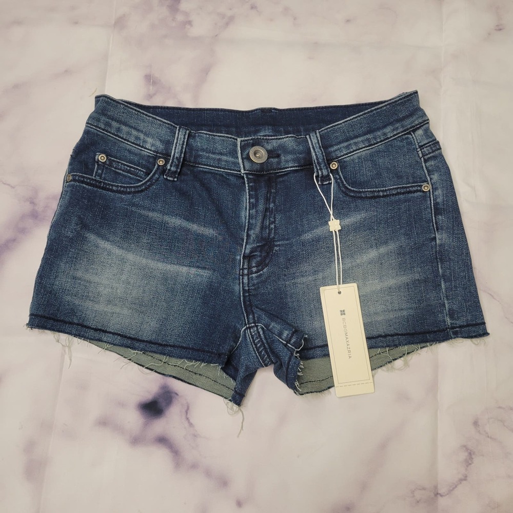 BCBGMaxazria Medium wash Raw Hem Denim Shorts